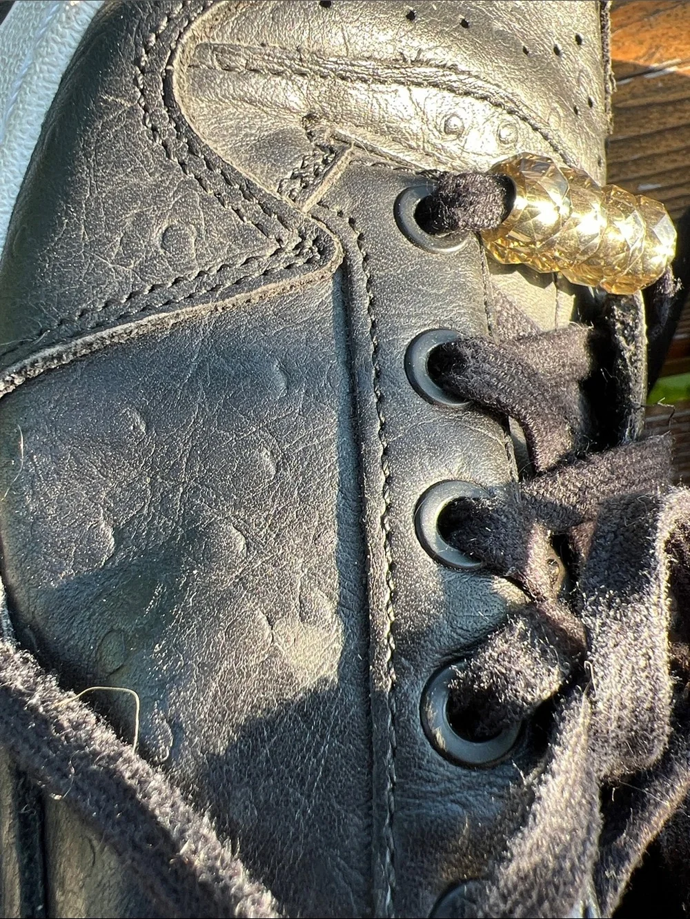 adidas Forum Black Leather Low-Top Sneakers with Gold Accents